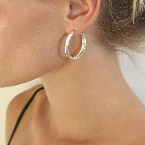 Sterling Silver sleek hoop earrings // Silver